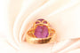 Bague 54 Bague motif corde en or jaune 750 sertie d’une améthyste 58 Facettes 250317