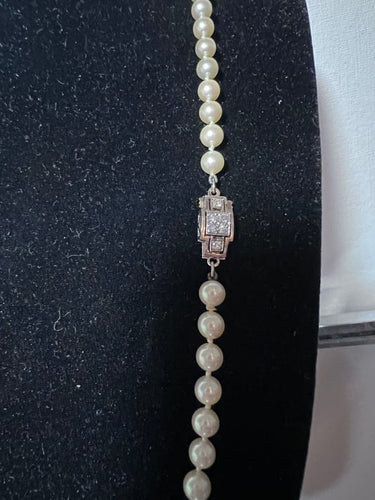 Collier Collier 77 perles de culture en chute, fermoir en or gris 18K et diamants 58 Facettes 887