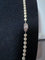 Collier Collier 77 perles de culture en chute, fermoir en or gris 18K et diamants 58 Facettes 887