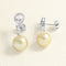 Boucles d'oreilles Boucles d'oreilles pendants perles, Or blanc et Diamants 58 Facettes 661D00003