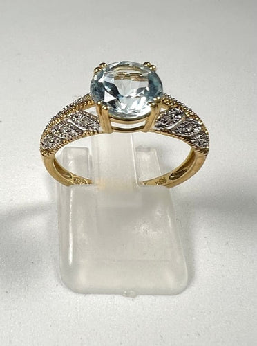 Bague 55 Bague ajourée en or jaune et or blanc 18 carats, topaze et diamants 58 Facettes 279