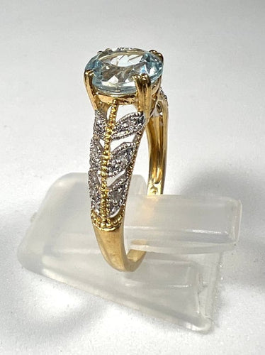 Bague 55 Bague ajourée en or jaune et or blanc 18 carats, topaze et diamants 58 Facettes 279