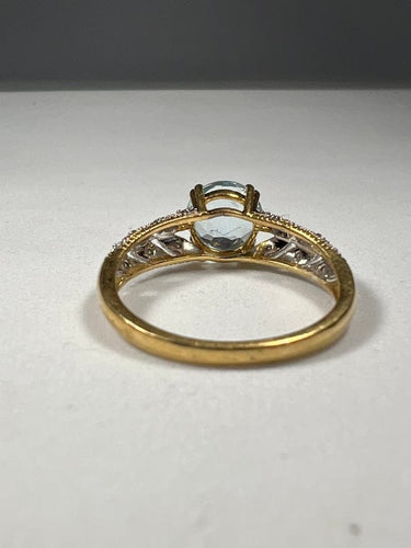 Bague 55 Bague ajourée en or jaune et or blanc 18 carats, topaze et diamants 58 Facettes 279