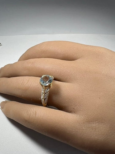 Bague 55 Bague ajourée en or jaune et or blanc 18 carats, topaze et diamants 58 Facettes 279