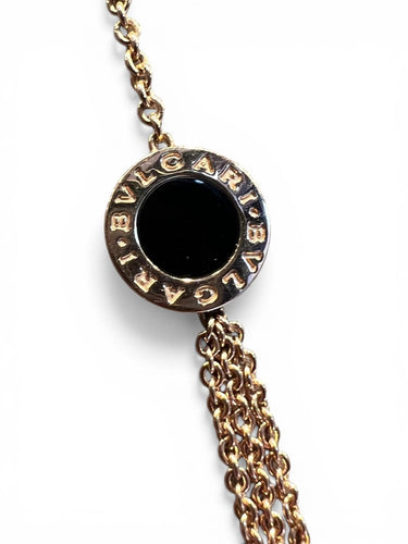 Collier Bvlgari Bvlgari - Collier sautoir en or rose 18 carats, nacre et onyx 58 Facettes 8058 A