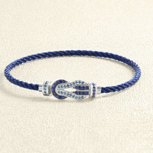 bracelet-sur-cable-fred-chance-infini-or-blanc-saphirs-topazes-bleues.jpg