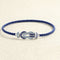 bracelet-sur-cable-fred-chance-infini-or-blanc-saphirs-topazes-bleues.jpg