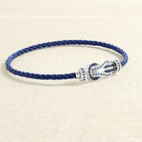 bracelet-sur-cable-fred-chance-infini-or-blanc-saphirs-topazes-bleues.jpg
