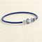 bracelet-sur-cable-fred-chance-infini-or-blanc-saphirs-topazes-bleues.jpg