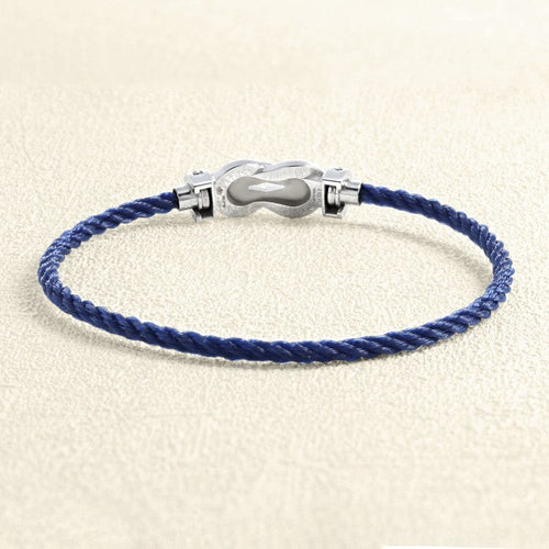bracelet-sur-cable-fred-chance-infini-or-blanc-saphirs-topazes-bleues.jpg