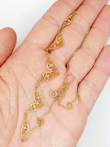 Collier Collier draperie Art nouveau en or rose 18k à motifs filigranés 58 Facettes A06789