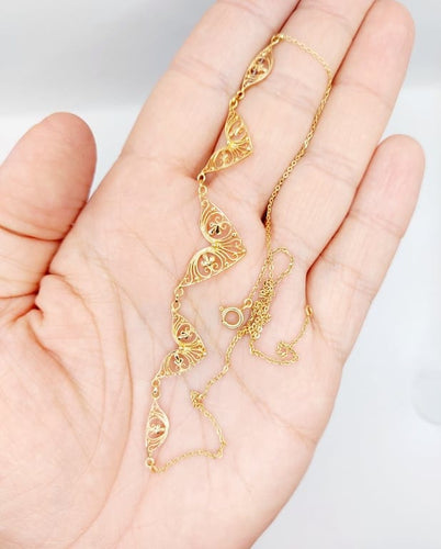 Collier Collier draperie Art nouveau en or rose 18k à motifs filigranés 58 Facettes A06789