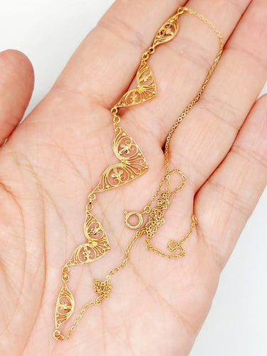 Collier Collier draperie Art nouveau en or rose 18k à motifs filigranés 58 Facettes A06789