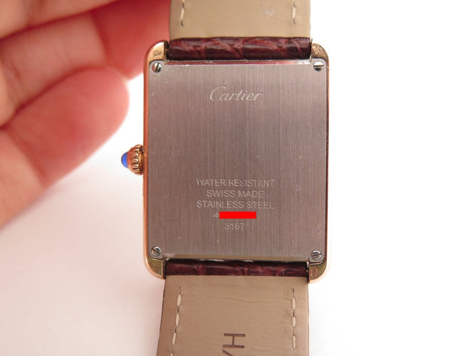 Montre montre CARTIER tank solo 3167 or rose 18k acier 2010 quartz 34mm + 2 bracelets 58 Facettes 273622