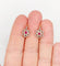 Boucles d'oreilles Dormeuses marguerite antiques en or rose 18k, platine, rubis synthétiques et diamants 58 Facettes A06712