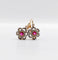 Boucles d'oreilles Dormeuses marguerite antiques en or rose 18k, platine, rubis synthétiques et diamants 58 Facettes A06712
