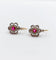 Boucles d'oreilles Dormeuses marguerite antiques en or rose 18k, platine, rubis synthétiques et diamants 58 Facettes A06712