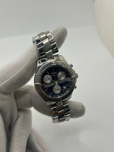 Montre Breitling Colt - Montre chronographe en acier quartz 58 Facettes 1636