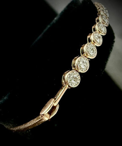 Bracelet Bracelet semi-rigide en or rose et blanc 18 carats serti de 11 diamants 58 Facettes Bracelet 02