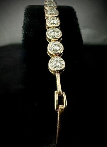 Bracelet Bracelet semi-rigide en or rose et blanc 18 carats serti de 11 diamants 58 Facettes Bracelet 02