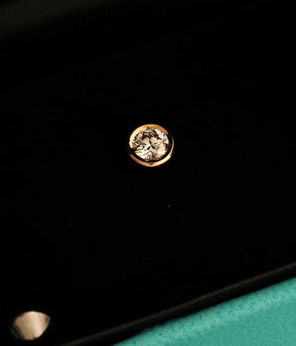 Boucles d'oreilles Tiffany & Co. Elsa Peretti - Boucles d’oreilles Diamonds by the Yard en or jaune 18K et diamants 58 Facettes Tiffany Studs