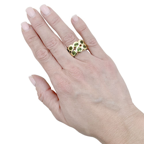Bague 52 Bague bandeau or jaune et péridots. 58 Facettes 35437