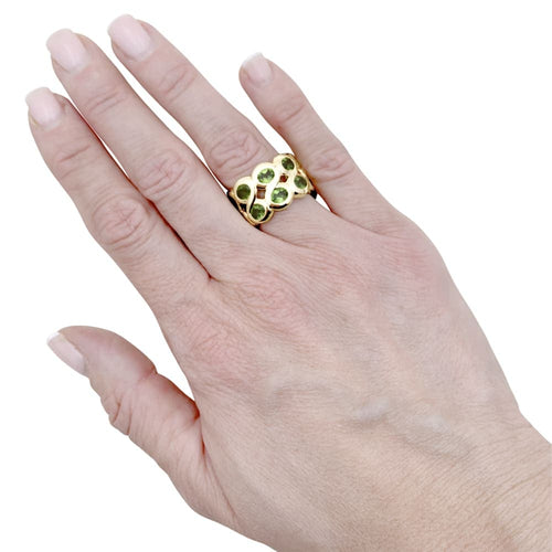Bague 52 Bague bandeau or jaune et péridots. 58 Facettes 35437