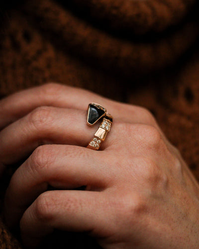 Bague 54 Bulgari Serpenti Viper - Bague en or rose, diamants et onyx 58 Facettes A11958