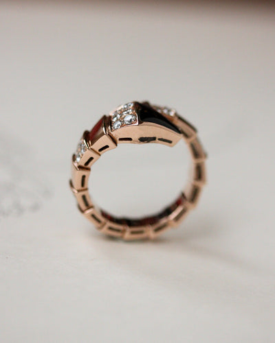 Bague 54 Bulgari Serpenti Viper - Bague en or rose, diamants et onyx 58 Facettes A11958