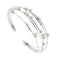 Bracelet Bracelet jonc ouvert multifils en or blanc 18 ct et diamants 58 Facettes 31275