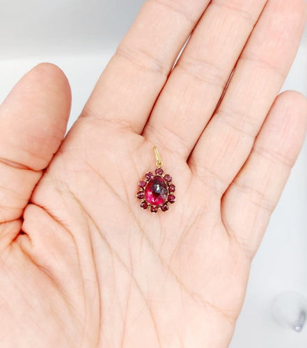 Pendentif Pendentif marguerite victorien en or rose 18k et grenats (vers 1870) 58 Facettes A06744