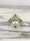 Bague 55 Bague en or jaune 18K avec tourmaline verte, diamants et tsavorites 58 Facettes 241