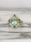 Bague 55 Bague en or jaune 18K avec tourmaline verte, diamants et tsavorites 58 Facettes 241