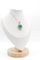 Pendentif Pendentif cœur en or blanc avec émeraude et diamants 58 Facettes 240165