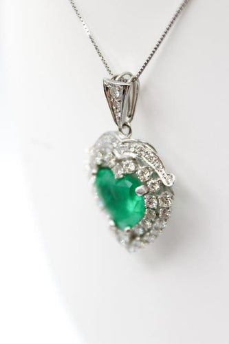 Pendentif Pendentif cœur en or blanc avec émeraude et diamants 58 Facettes 240165