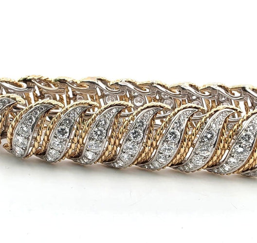 Bracelet Bracelet années 1940-1950 en platine et or avec diamants 58 Facettes 34/26 E