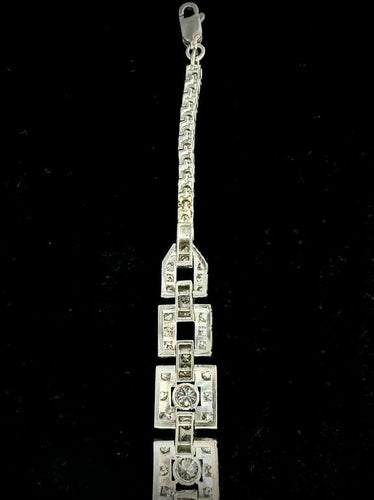 Bracelet Bracelet Art déco en platine et or blanc, émeraude et diamants 58 Facettes Bracelet 11