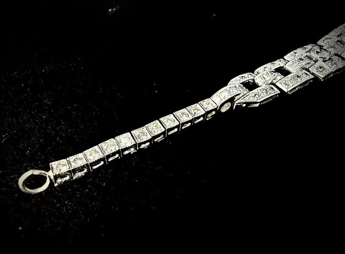 Bracelet Bracelet Art déco en platine et or blanc, émeraude et diamants 58 Facettes Bracelet 11