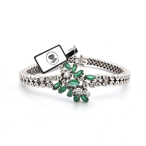 Bracelet Bracelet vintage en or blanc 18 ct avec émeraudes et diamants 58 Facettes 383/A OC
