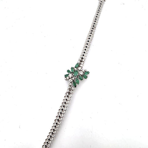 Bracelet Bracelet vintage en or blanc 18 ct avec émeraudes et diamants 58 Facettes 383/A OC