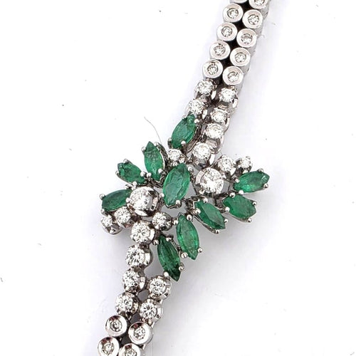 Bracelet Bracelet vintage en or blanc 18 ct avec émeraudes et diamants 58 Facettes 383/A OC