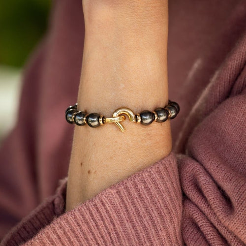 Bracelet Cartier - Bracelet perlé en or jaune et hématite 58 Facettes 50222