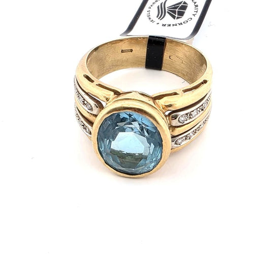 Bague 59 Bague années 90 en or jaune 18 ct, topaze bleue et diamants 58 Facettes 188/D SHD 94/26