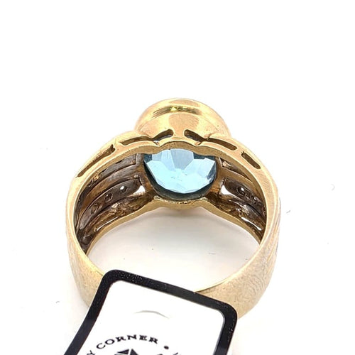 Bague 59 Bague années 90 en or jaune 18 ct, topaze bleue et diamants 58 Facettes 188/D SHD 94/26