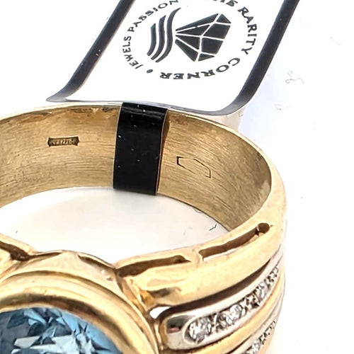 Bague 59 Bague années 90 en or jaune 18 ct, topaze bleue et diamants 58 Facettes 188/D SHD 94/26