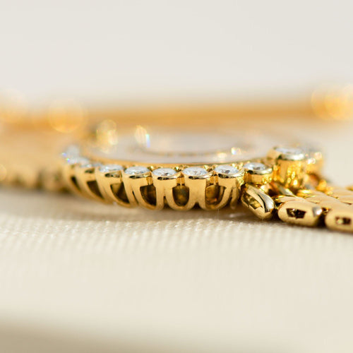 Montre Chopard Happy Diamonds - Montre femme en or jaune 18k et diamants 58 Facettes 3292