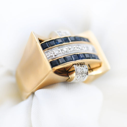 Bague Bague réversible en or 18 carats sertie de diamants, de rubis et de saphirs 58 Facettes 22539