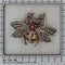 Broche Broche abeille de l'entre-deux-guerres avec diamants et rubis en or et argent 58 Facettes 26050-0263