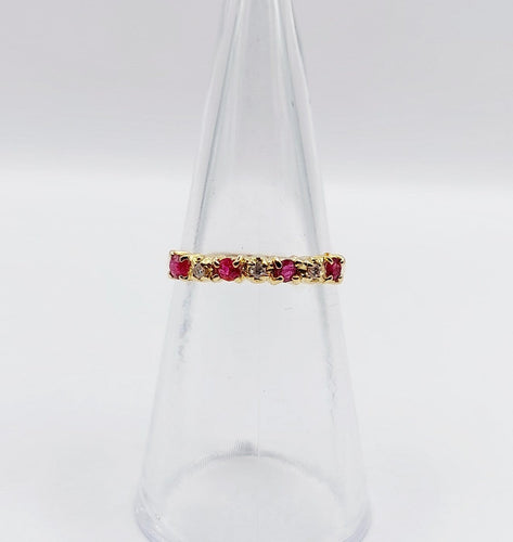 Bague 50 Demi-alliance vintage en or 18k, rubis et diamants 58 Facettes A06820