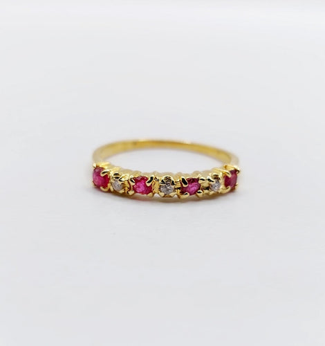Bague 50 Demi-alliance vintage en or 18k, rubis et diamants 58 Facettes A06820